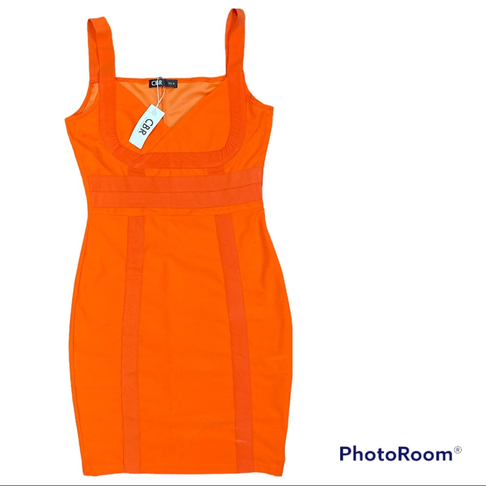 Orange 🍊 mini dress.